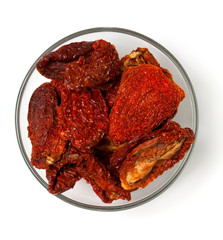 dried tomatoes in a glass bowl