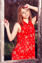 Fototapeta premium Girl in the window