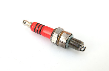 auto spark plug isolated on white background. Isolated sparking