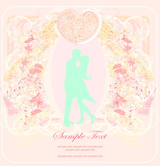 Floral greeting card with silhouette of romantic couple