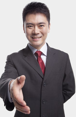 Businessman Extending His Hand