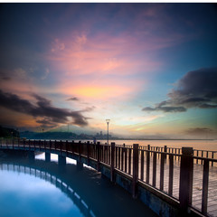 beautiful sunset with a bridge over