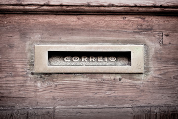 Letters slot at Old Wooden Door in Lisbon