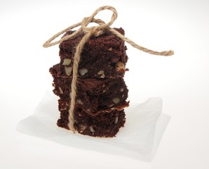 chocolate and almond cake tied up with cord