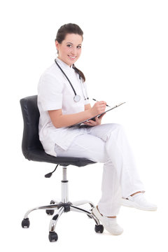 Young Female Doctor Sitting Over White Background