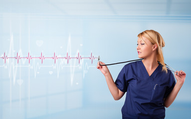 Pretty medical doktor listening to red pulse and heart rates