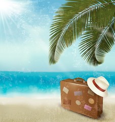 Obraz premium Vintage beautiful seaside background with suitcase and a hat. Ve