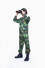 Man in military uniform using binoculars