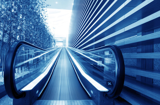 Moving escalator in an airport