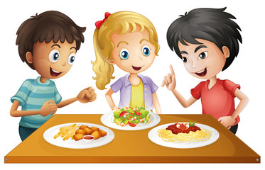 Kids watching the table with foods