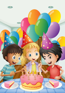 Three kids celebrating a birthday
