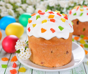 Easter cake and eggs on a white table