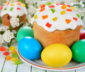 Easter cake and eggs on a white table