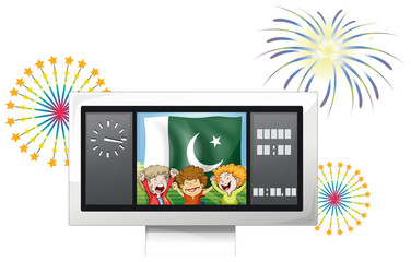 Three kids inside the scoreboard in front of the Pakistan flag