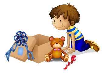 Dekokissen Ein Junge schaut auf die Kiste © GraphicsRF