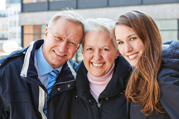 Fototapeta na wymiar Happy seniors with grandchild
