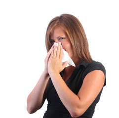 women blowing nose