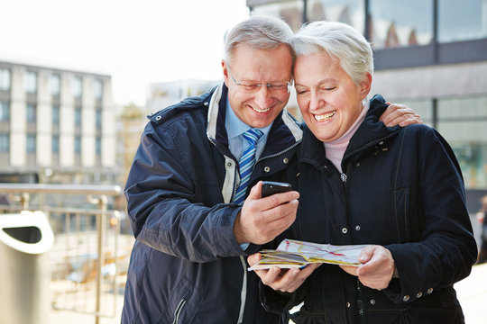 Senior Couple With City Guide App