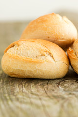 Bread on wooden table close up