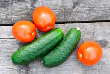 Raw vegetables on wooden table