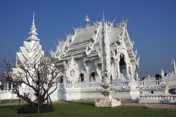 Modern Buddhist sculpture,..White temple in Thailand.