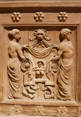 Fototapeta na wymiar Detail wooden door in the City Hall of Seville, Spain