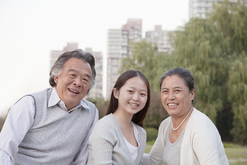 Granddaughter with grandparents, portrait