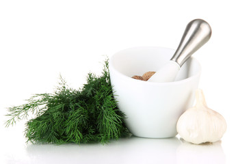 Mortar, herbs and garlic, isolated on white