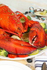 Red lobster on platter on serving table close-up