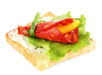 Salami rolls with paprika pieces inside,