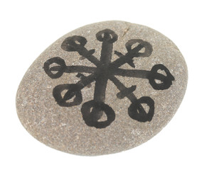 Fortune telling  with symbols on stone isolated on white