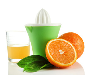 Citrus press, glass of juice and ripe oranges, isolated on
