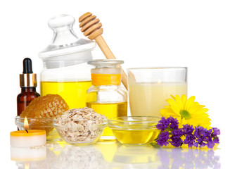 Fragrant honey spa with oils and honey isolated on white