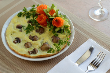 Omelet with mushrooms and vegetables