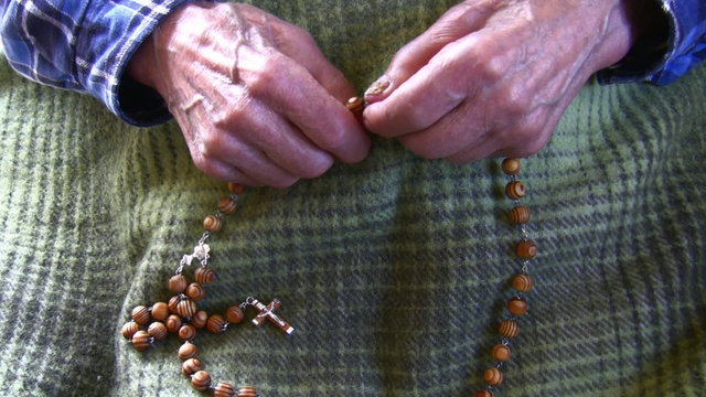 Senior praying rosemary