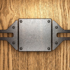 metal on wood background