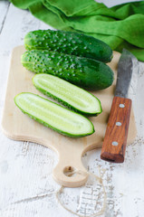 Fresh cucumbers on the cutting Board