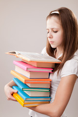 Teenager girl with books