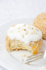 close-up of cottage cheese pancakes with yoghurt and nuts