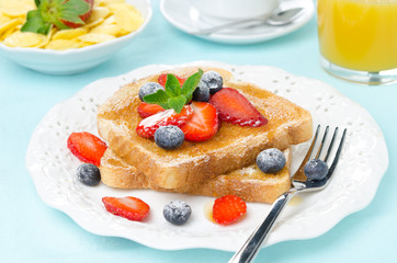 crispy toast with honey, fresh berries, coffee, orange juice