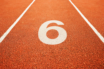 number six on running track - obrazy, fototapety, plakaty