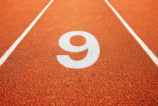 number nine on running track