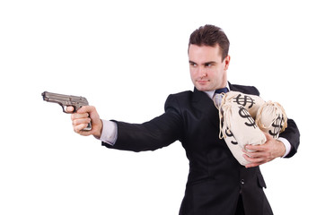 Man with gun and sacks of money