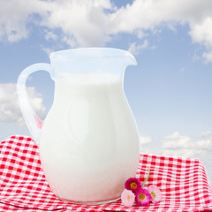 Obraz na płótnie Canvas glass pitcher full of milk