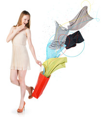 Woman with clothes flying into the bag