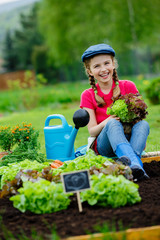 Gardening, vegetable - young girl helping in the garden