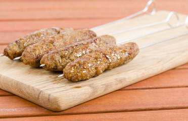 Seekh Kebabs - Minced meat kebabs on metal skewers