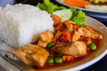 Fried rice, sweet and sour fish.