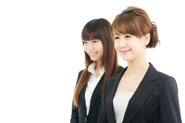 Beautiful asian businesswomen isolated on white background