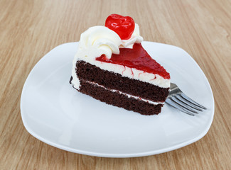 chocolate cake and fresh cherry